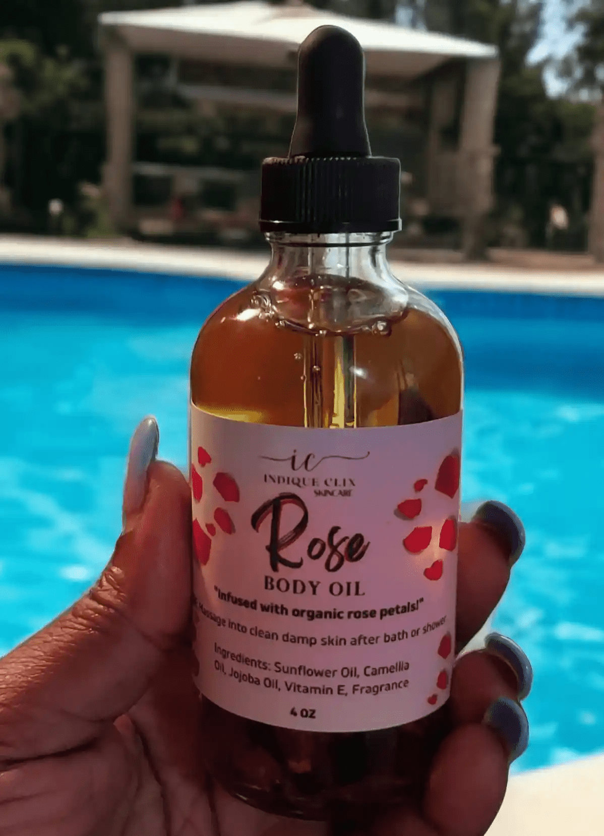 Bottle of rose Infused body oil