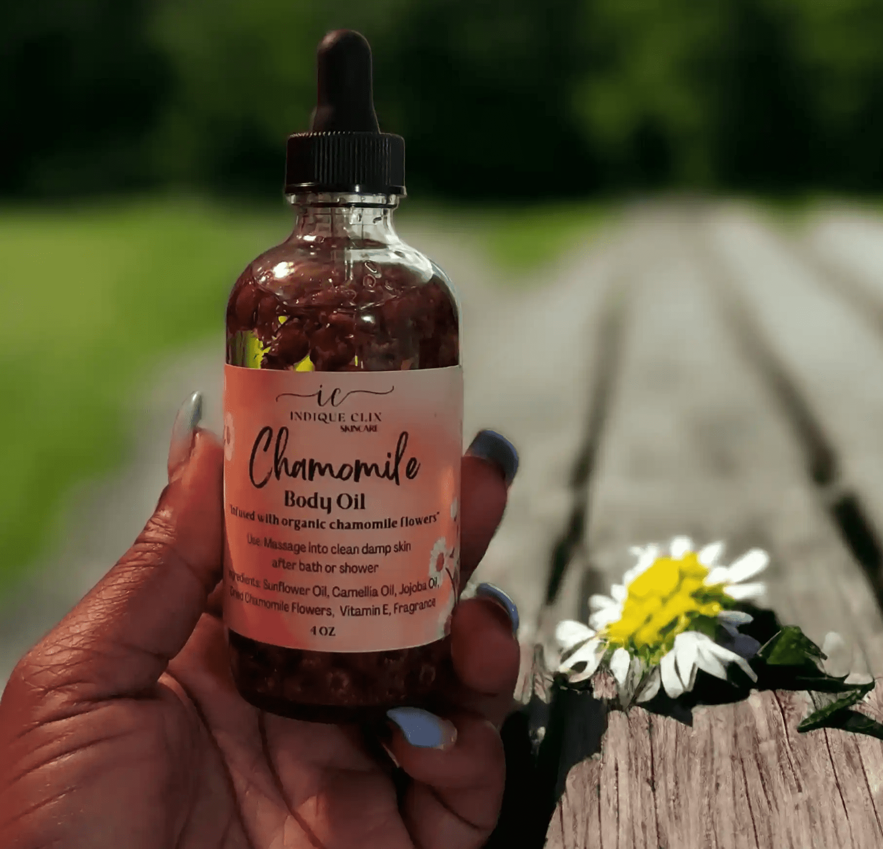 Bottle of chamomile infused body oil